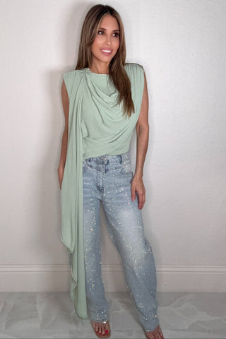 Soft mint sleeveless draped scarf top with a scarf-inspired overlay and asymmetric hemline.