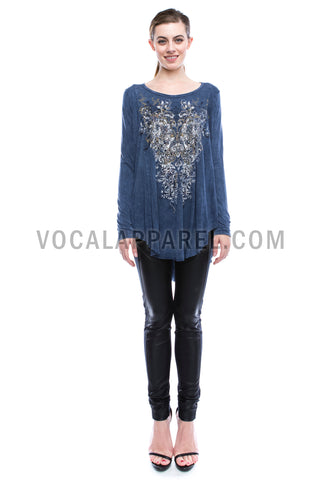 Denim-inspired blue print long sleeve top with rhinestone embellishments and a relaxed boutique silhouette.
