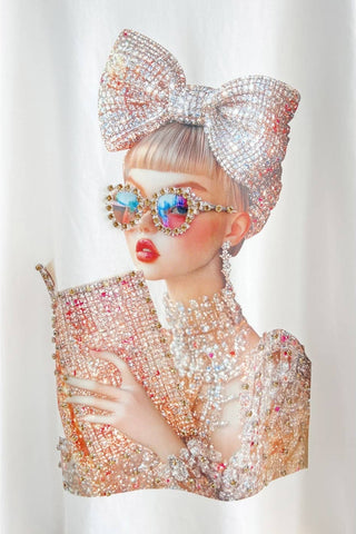 Person wearing a sparkling outfit with a large bow and colorful accessories on a white background