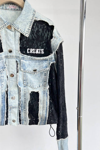 Denim jacket with black distressed design and 'CREATE' text on a white background
