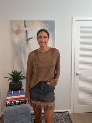 Bronze metallic long sleeve pullover sweater top with a crew neckline and floral embroidered embellishments on the front.