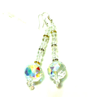 Iridescent and yellow crystal drop earrings with faceted beads and a sterling silver hook post.