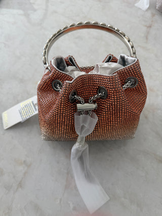 Style the Shades Of Orange Allover Crystal Handbag exclusively at Born To Glam