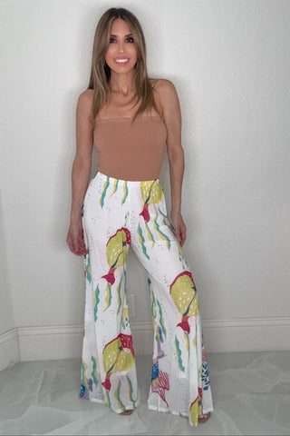 Style the Ivory Tropical Fish Print Wide Leg Mesh Pants exclusively at Born To Glam