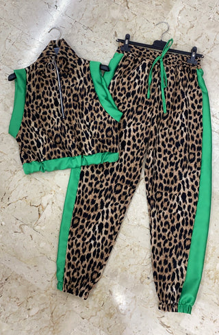 Leopard print track set with green stripe color blocking, a half zip tank jacket, and matching jogger pants.
