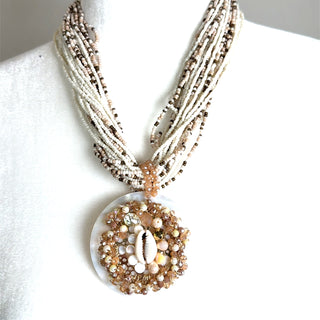 Style the Ivory Shell Pendant Beaded Necklace exclusively at Born To Glam