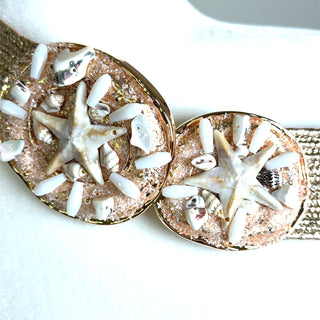 Style the Gold Metallic Stretch Seashell Buckle Belt exclusively at Born To Glam