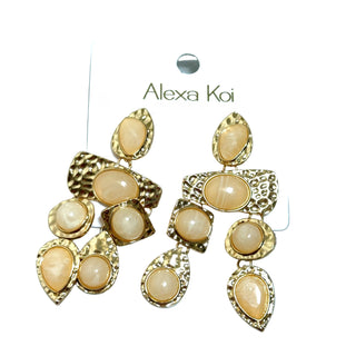 Ivory and hammered gold dangle earring with textured gold detail and a polished boutique jewelry look.