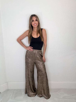 Style the Python Print Wide Leg Pants exclusively at Born To Glam