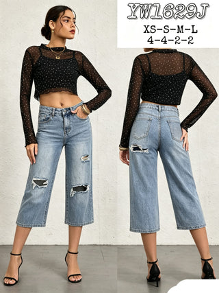 Light blue distressed crop wide leg jeans with rhinestone and crystal embellishment for a standout boutique denim look.