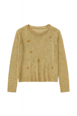 Gold embellished long sleeve sweater top with warm metallic shimmer and floral detailing across the front.