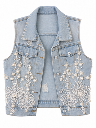 Light wash blue denim vest with white lace pearls crystals and distressed trim on a white background