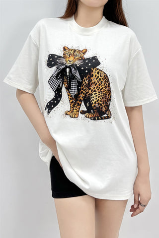 Lemon yellow oversized graphic tee featuring a bold leopard design and 3D bow embellishment on the front.